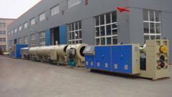 Ligne d'extrusion de tubes en plastique